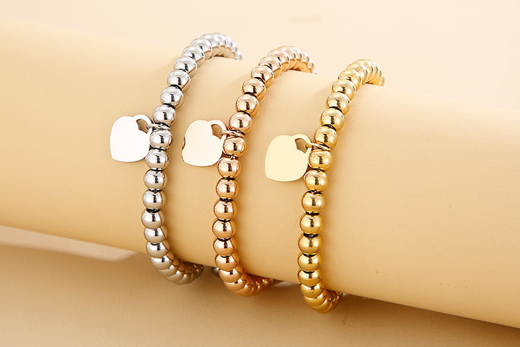 Adjustable Bubble Bracelet with Single Heart Charm in Titanium Steel - 18K Gold Plated