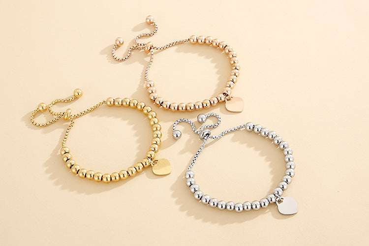 Adjustable Bubble Bracelet with Single Heart Charm in Titanium Steel - 18K Gold Plated
