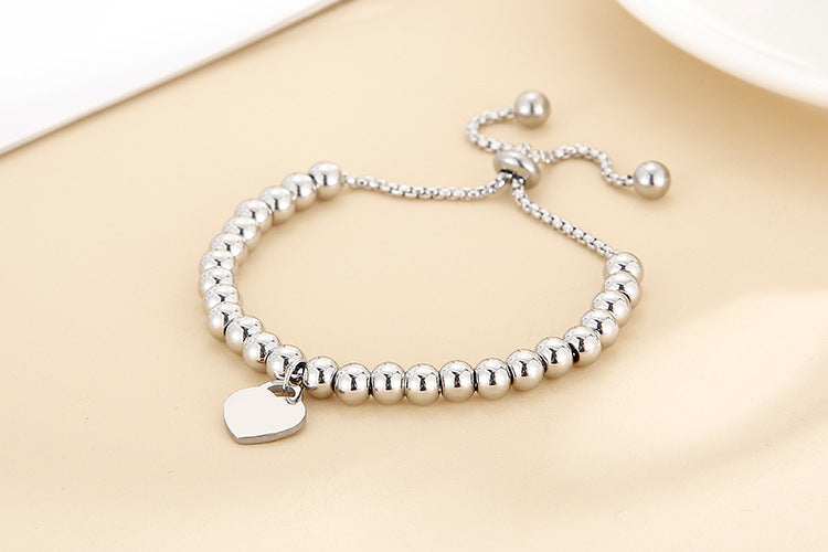 Adjustable Bubble Bracelet with Single Heart Charm in Titanium Steel - 18K Gold Plated
