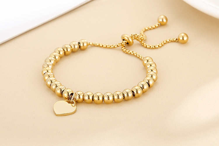Adjustable Bubble Bracelet with Single Heart Charm in Titanium Steel - 18K Gold Plated