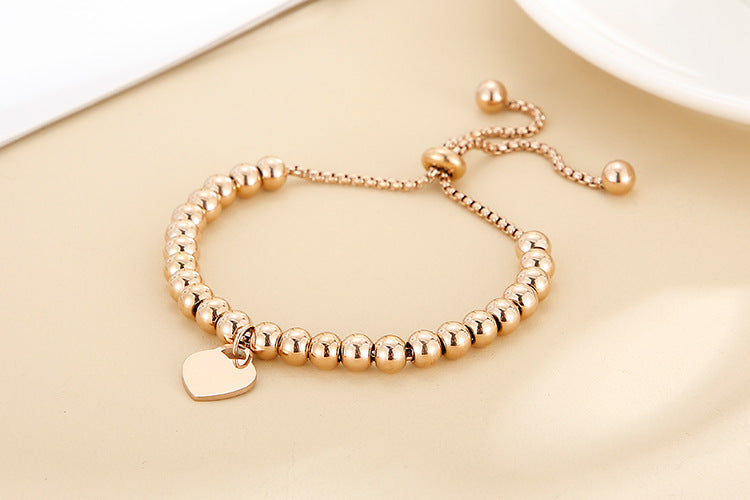 Adjustable Bubble Bracelet with Single Heart Charm in Titanium Steel - 18K Gold Plated